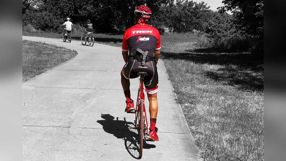 Read more about the article Can You Carry a Gun on a Bicycle: Essential Legal Tips Revealed